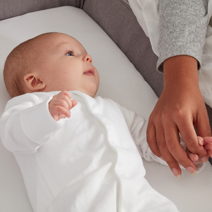 Comment faciliter la transition de votre bébé du berceau au lit à barreaux